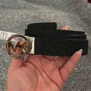 Michael Kors woman’s reversible belt.
